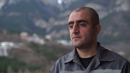 Portrait of male worker of Caucasian nationality close-up.