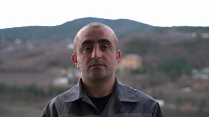 Portrait of male worker of Caucasian nationality close-up.
