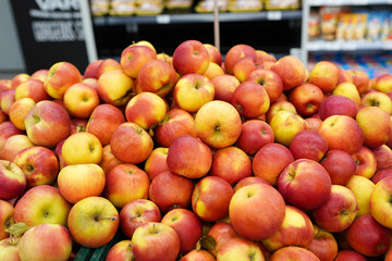 close up of apples on market stand