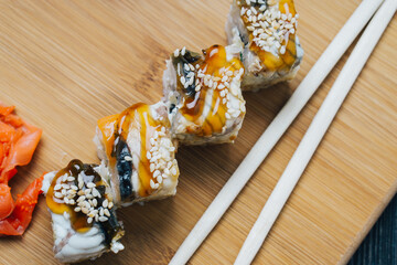ginger sushi chopsticks wood board japanese cuisine restaurant snack