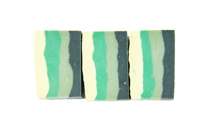 Fragrant organic multi-colored soap on a white background.