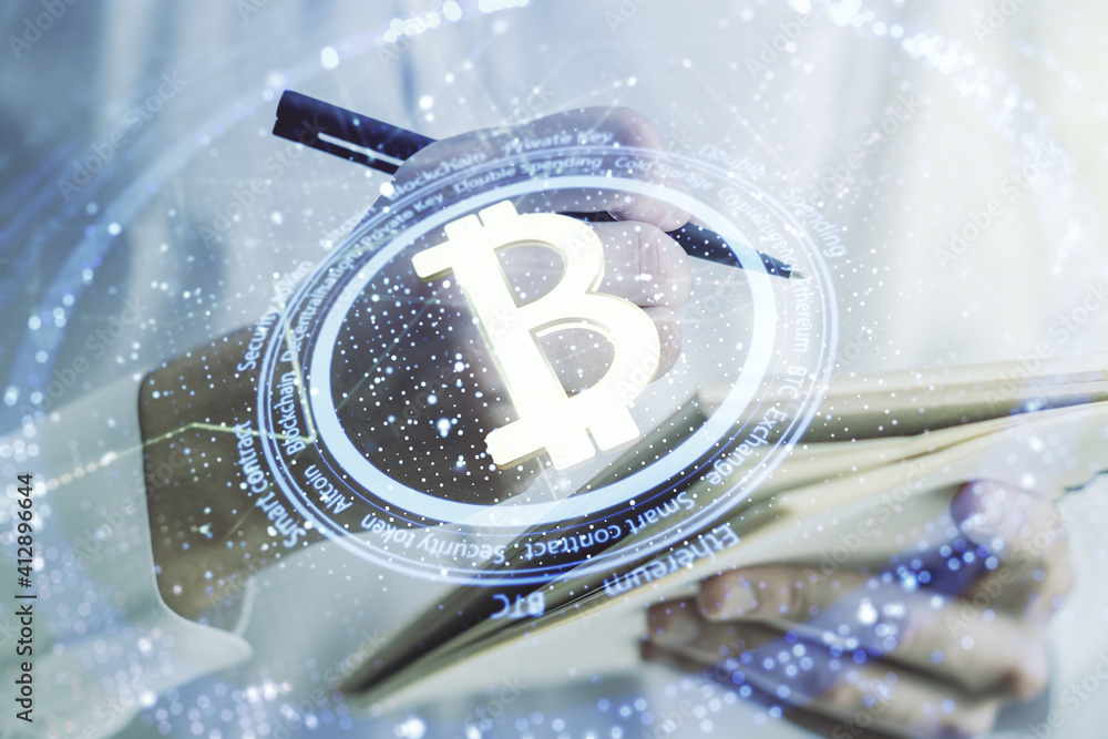 Poster double exposure of creative bitcoin symbol hologram with man hand writing in notepad on background. 