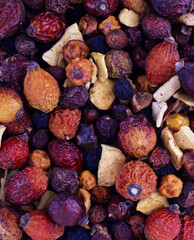 Dried fruits with nuts. Cashew, hazelnuts, peanuts, dried apricots, viburnum, raisins.