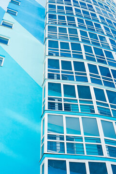 colored per building, windows on colorful building, House
