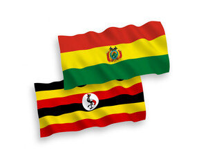 Flags of Bolivia and Uganda on a white background