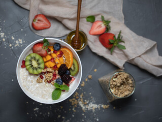 Close up two glasses of chia pudding decorated with fresh baby figs with spoon on table with copy space. Healthy food healthy lifestyle concept. High quality photo
