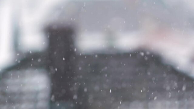 Slow motion of falling snow. Blurred winter background. Snowing dream. Winter cold weather