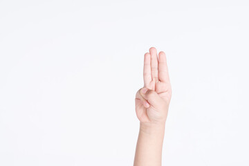 A kid hand with three finger salute as a symbol for protesting against dictator