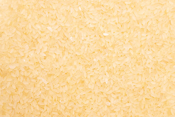 A full page of uncooked rice background texture