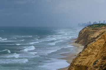 Arsuf cliff, a kurkar sandstone cliff reserve towering high above the Mediterranean sea coastline between Herzliya and Netanya towns, Israel.
