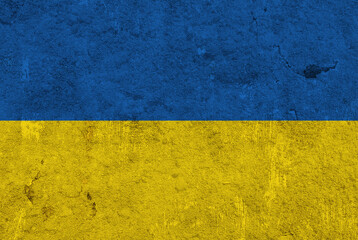 Fahne von Ukraine auf verwittertem Beton