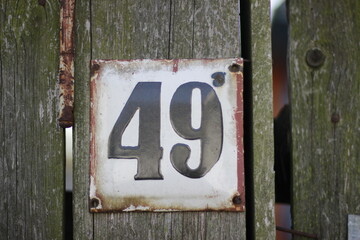 old sign with number forty-nine