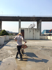 worker poured concrete floors.