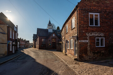 Fototapeta na wymiar Narrow and empty Church Street and corner of Bury Line in Chesham, town in Buckinghamshire, England 