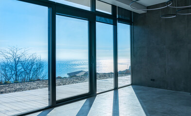 Sea view from the room of the new house. Minimalism and color trends in modern interiors