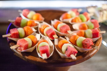 fruit skewer on plate for guest in party