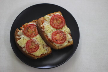 Pizza toast with home baked bread loaf