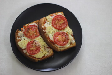 Pizza toast with home baked bread loaf
