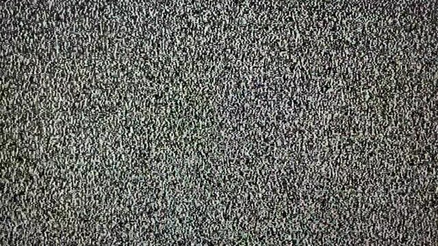 TV noise. CRT picture from an retro retro TV. Black and white TV pixels. There is no signal. Abstract background and texture. Camera off.
