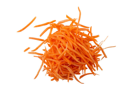 Organic fresh grated carrot on white background