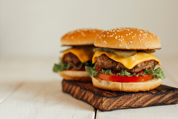 burgers on wooden background 