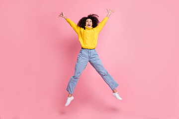 Fototapeta na wymiar Full size photo of young crazy latin girl happy positive smile have fun jump up isolated over pastel color background