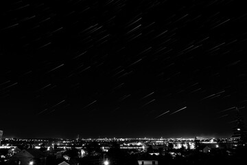 Star trails, movement of stars over a provincial Russian town