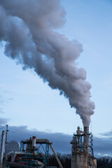 smoke coming out of factory chimney industry and global warming