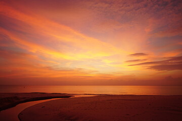 Fototapeta na wymiar Nature image Landscape view of sunset over beach. Twilight sky red background.