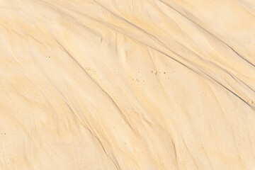 Fine beach sand in the summer sun