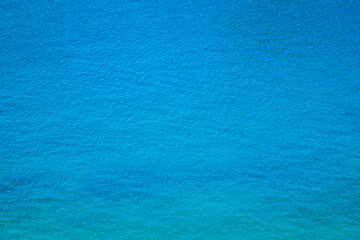 Clear azure water. Turquoise sea. Delicate shades of ocean blue.