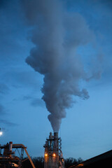 smoke coming out of factory chimney industry and global warming