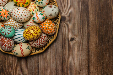 Colorful Easter Egg banner.Above view with copy space.Happy Easter decoration background,colorful hand painted decorated eggs.Festive tradition for Eastern European countries.Holiday Still life photo.