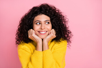 Photo portrait of cute dreamy girl in knitted sweater looking empty space hands near face isolated...