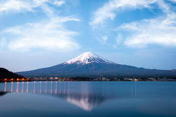 Mount Fuji at dusk near Lake Kawaguchi in Japan.