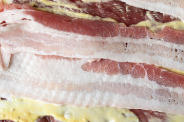 Raw meat texture background closeup bacon.