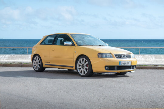 BARCELONA, SPAIN-FEBRUARY 2, 2021: 1999&ndash;2003 Audi S3  "quattro" (facelift, First generation, Typ 8L) finished in Imola Yellow next to sea.
