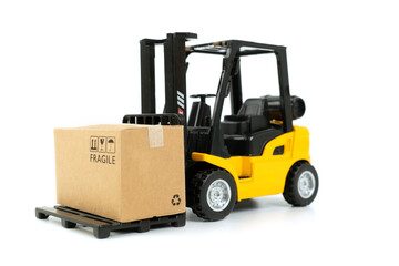 Mini forklift truck loading box on white background. online shopping concept