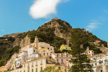 Fototapeta na wymiar Panoramic view of the city and mountains on the sunny day. Amalfi. Italy.