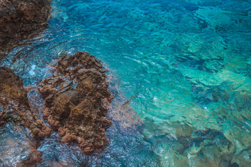 Rocks and the azure sea. Turquoise clear water. - 412934698