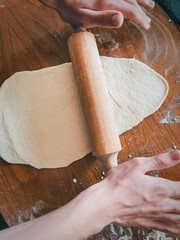 hands making dough
