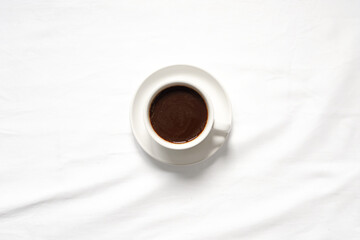white cup of coffee