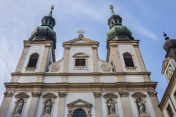 Obraz premium Baroque Jesuit Church (Jesuitenkirche, 1627), also known as University Church (Universitatskirche) - two-floor, double-tower church in Vienna. Austria.