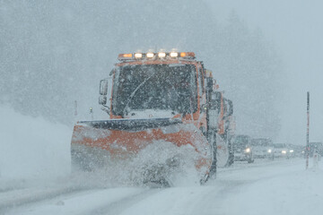 snow plow on country road