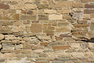 Castle wall made of old stones textures for design and photo background.
