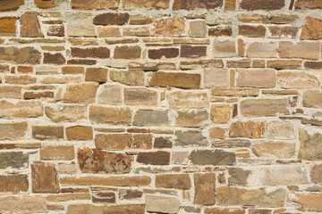 Castle wall made of old stones textures for design and photo background.