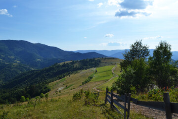 Fototapeta na wymiar panorama of the summer Carpathian mountains in the clouds