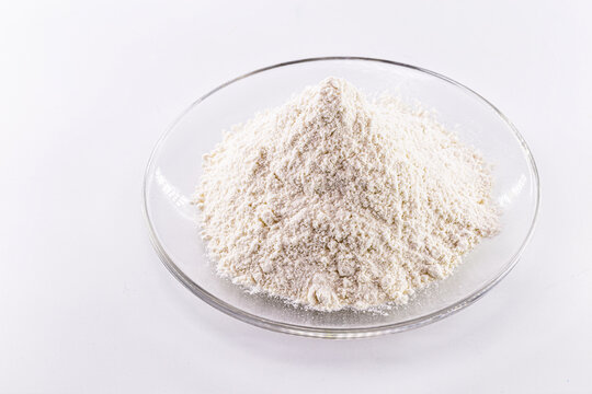 Pile of Solid Potassium Chlorate on white background
