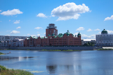 Colorful buildings on the river bank . Yoshkar-Ola. Russia