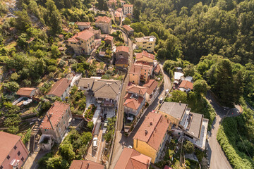 Fototapeta na wymiar Aerial view of ancient village Colonnata situated in the Apuan Alps, province of Massa-Carrara, Tuscany, Italy